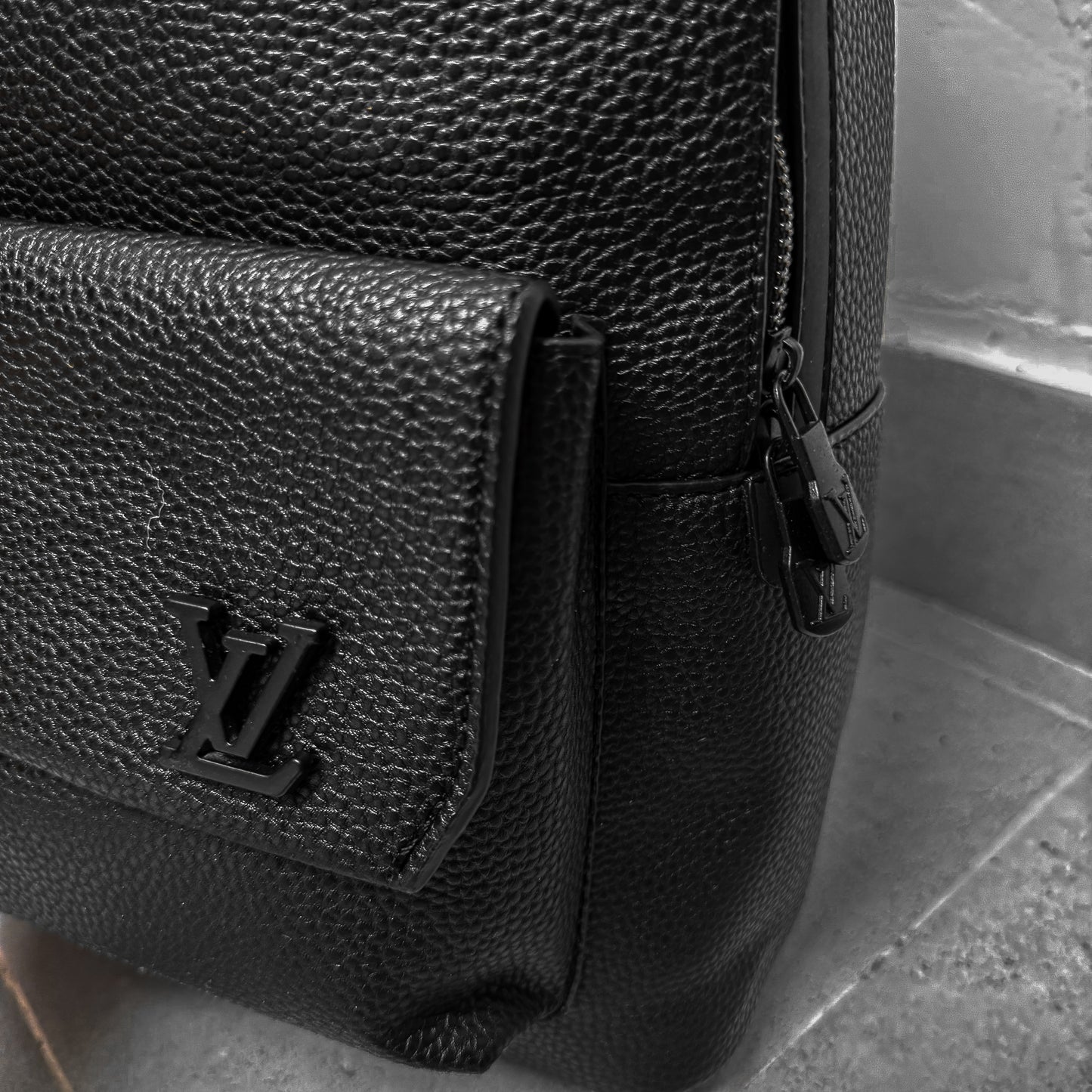 LV CURVED LOGO BACKPACK